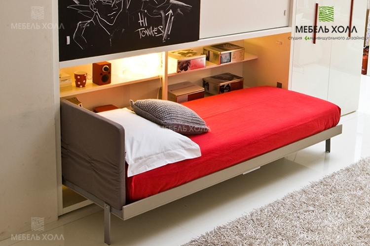 Кровать-трансформер с навесными шкафчиками и доской для рисования. Выполнена из ДСП.