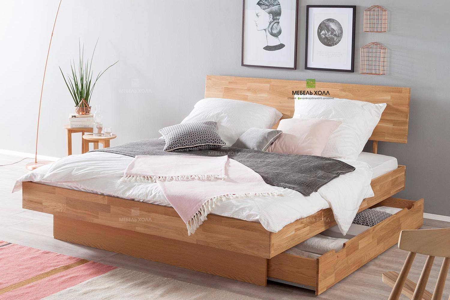 Кровать на два спальных места из шпона с одним сплошным выдвижным ящиком на направляющих компании Hettich.
