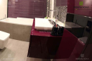 Современный навесной комод для ванной насыщенного бордового цвета. Выполнен из МДФ