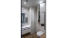 Мебель для ванной комнаты: шкаф с доступом к счетчикам, система хранения над инсталляцией. Материал: матовый крашеный МДФ