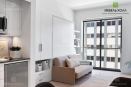 Диван-кровать-шкаф трансформер экономит пространство и позволяет совместить гостиную и спальню в небольших квартирах. Стенка и шкафы выполнены из крашенного МДФ