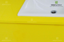 Ярко лимонный в ванную. Выдвижные ящики оснащены встроенными ручками. Выполнен из глянцевого МДФ