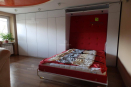 Современная кровать-трансформер, встроенная в шкаф существенно экономит место в комнате и зоны хранения. Материал исполнения: белый МДФ. 