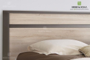 Современная кровать в оттенках серого и шоколада выполнена из МДФ со вставками из массива в лаконичном стиле